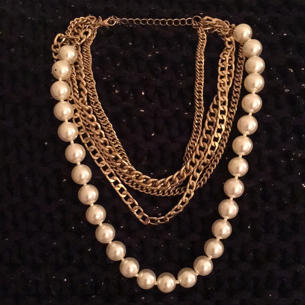 Gold chain and pearl necklace
